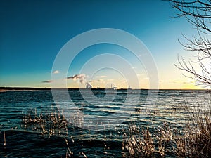 seascape on the background of dawn and blue sky