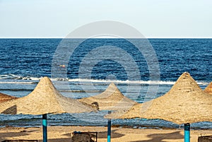 Sandy Beach and Straw Umbrellas - Red Sea Marsa Alam Egypt Africa