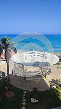 seascape, blue sea sky palm tree, Netanya Israel