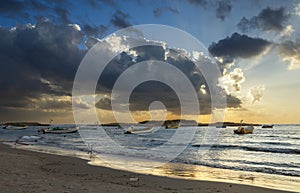 seascape with boats on Hof Dor at sunset in Israel