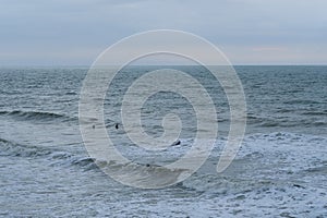 seascape on the coast of england with serfing