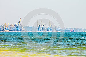 Seascape and commercial port background , turquoise water, sunny