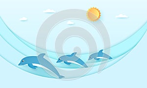 Seascape, dolphins with sea waves blue sky with sun and cloud