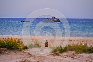 Seascape of a fishing boat in Maayan Zvi, Hof Hacarmel region Israel.