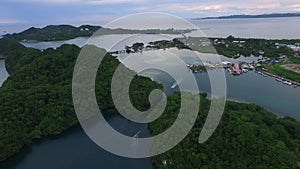Seascape of Koror island in Palau. Boat and Cityscape in Background I