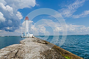 Seascape with lighthouse on the Black Sea in Odesa during the summer season