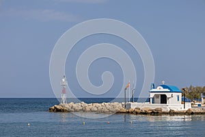 Seascape. The lighthouse at the church in the town of Faliraki in Greece on the island of Rhodes