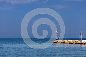Seascape. The lighthouse at the church in the town of Faliraki in Greece on the island of Rhodes