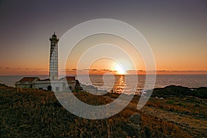 Seascape with lighthouse and sunset at sunset on Ustica island i