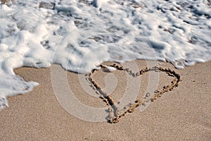 Seascape. Love, summer, sea, sun, beach, fun, holiday and a big heart on the sand