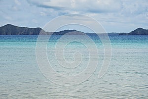 Seascape with mountain and tree at ocean. Koh Chang island, Thailand.