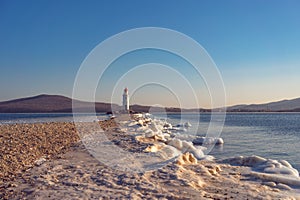 Seascape overlooking The Tokarev lighthouse against the blue sky