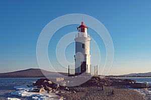 Seascape overlooking The Tokarev lighthouse against the blue sky