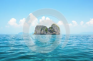 Seascape with rock island in the tropical sea