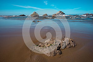 Seascape of rock stacks and beach view in oregon coastline