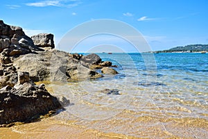 Seascape of rocky seashore sandy beach in Samui island, Thailand