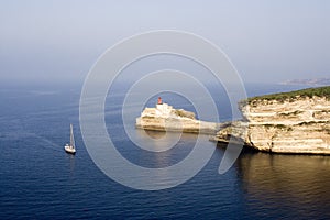 Seascape with sailboat