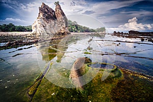 Seascape scenery at Tanjung Layar beach, Sawarna, Banten, Indonesia photo