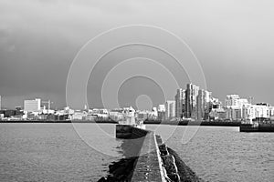 Seascape and skyline with bright lighthouse. Sea port navigation concept. Sea transportation and navigation. Lighthouse