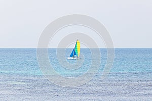 Seascape with small sailing boat