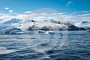 Seascape with snow covered mountains in Cierva Cove, Antarctica.