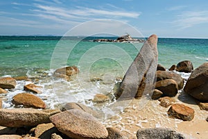 seascape with stone arch over sea in summer, Ko Man Klang, Rayong