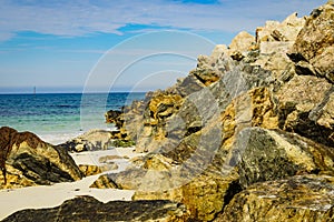 Seascape with stone breakwater