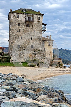 Seascape with Stones Medieval tower in Ouranopoli, Athos, Chalkidiki, Greece