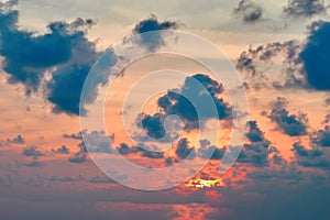 Seascape summer sunset at sea. Clouds in orange light Evening sun. Loneliness landscape.