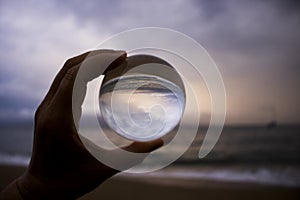 Seascape with Sunset Clouds as Storm Approaches Captured in Glass Ball