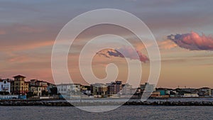 Seascape, sunset over the Tuscan town of San Vincenzo, Italy