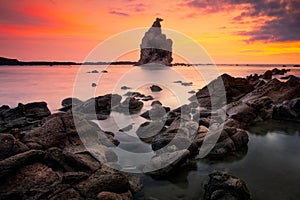 Seascape sunset scenery at Tanjung Layar beach,Sawarna, Banten, Indonesia photo