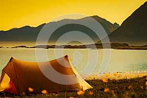 Seascape with tent on beach, Lofoten Norway