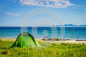 Seascape with tent on beach, Lofoten Norway