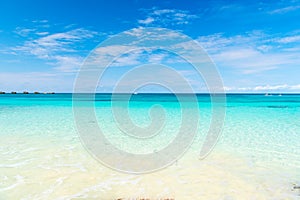 Seascape with transparent water on blue sky horison. Sea beach in Great stirrup cay, Bahamas on sunny day. Summer vacation on cari