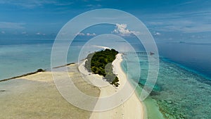 Seascape with tropical island. Semporna, Sabah, Malaysia.