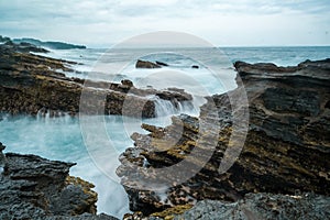 seascape is very beautiful with coral rocks and sea water that looks very soft like cotton. slow shutter speed effect