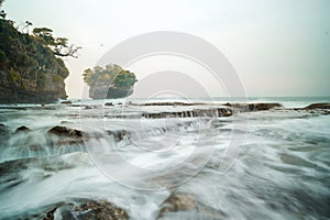 seascape is very beautiful with coral rocks and sea water that looks very soft like cotton. slow shutter speed effect