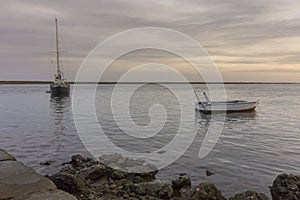 Seascape view of Olhao dockyard, waterfront to Ria Formosa. Algarve. photo