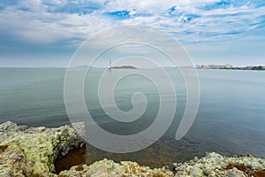 Seascape with a white yacht in La Manga del Mar Menor on a sunny day photo