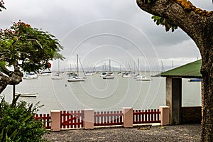 Seascape with yachts on the calm sea at Santo Antonio de Lisboa, Florianopolis, Brazil