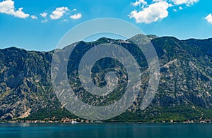 seascapes, a view of the Bay of Kotor during a cruise on a ship in Montenegro, a bright sunny day, mountains and coast, the