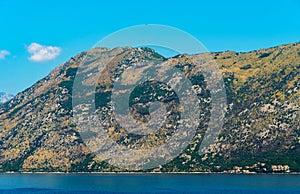 seascapes, a view of the Bay of Kotor during a cruise on a ship in Montenegro, a bright sunny day, mountains and coast, the