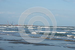 Seashore with seaport Midia in background