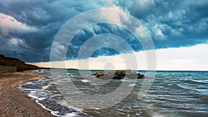 Seashore stormed with dramatic clouds, nature