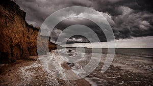 Seashore stormed with dramatic clouds, nature