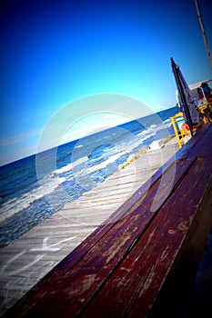 Seashore-view from the boardwalk to the beautiful sea, the sun, the sky.