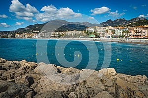 Seaside buildings and famous beach of Menton, France