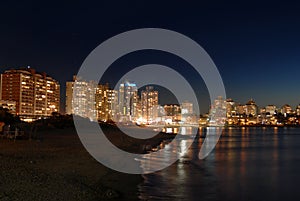 Seaside buildings at night