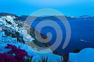 Seaside evening view of Oia and Caldera Santorini Greece